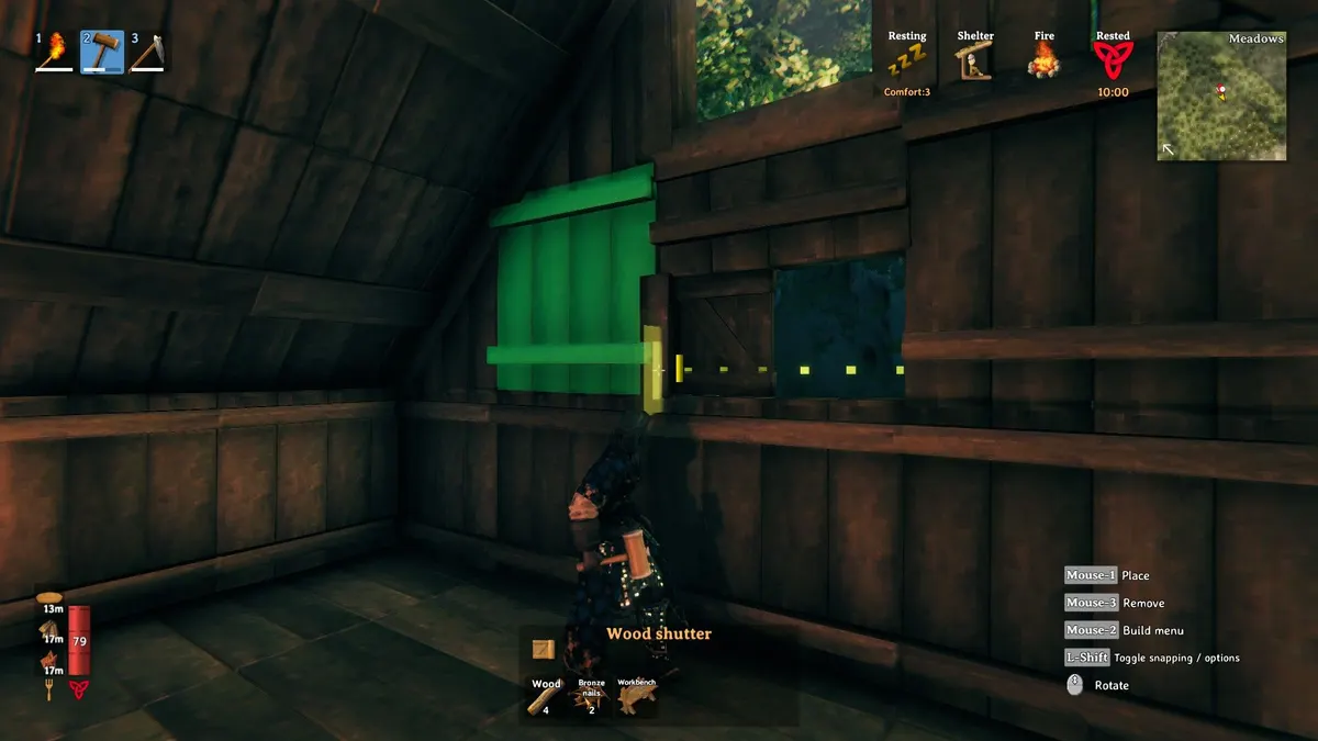A Viking inside a timber building, with rafters overhead and a shutter placement preview.
